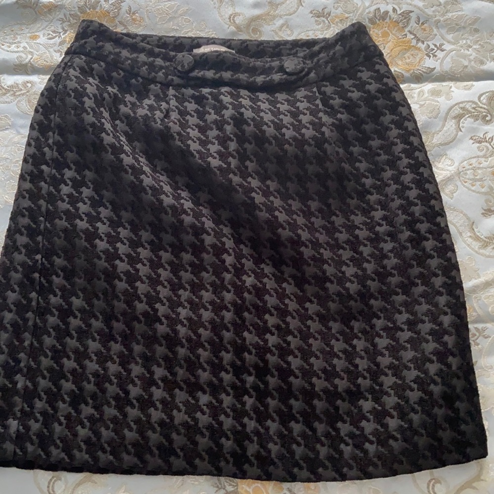 A black short skirt, in used good condition